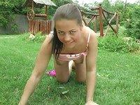 A busty Latina plays with herself outdoors on the grass in this solo scene - movie 6 - 5