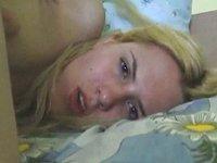 A teen blonde bends over and slides her fingers along her pink pussy - movie 4 - 6