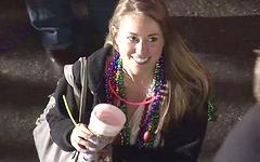 Sharon wears a pink boa to Mardi Gras - movie 10 - 4