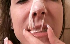 Marie Madison blows a bubble and pops it on her face - movie 3 - 7