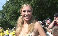 More college girls undress in a huge event trying to win strip contest - movie 2 - 7