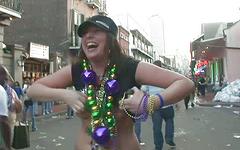 Some mature ladies on the street are showing their tits to get beads - movie 5 - 4