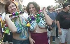 Some mature ladies on the street are showing their tits to get beads - movie 5 - 6