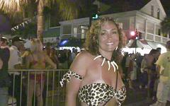 A big boobed blonde is the highlight of this outdoor street party scene - movie 9 - 4