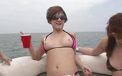 Busty teens ride on the boat and show off their hot bodies to the camera - movie 1 - 5