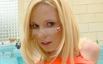 Download Pretty blonde in glasses yasmine sucks off a man by the side of a pool