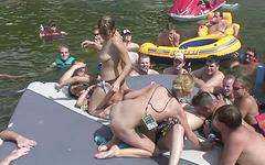 Olivia starts to strip in front of everyone on the boat - movie 2 - 4