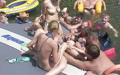 Olivia starts to strip in front of everyone on the boat - movie 2 - 7