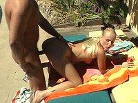 Blonde slut Sharon Wild gets eaten out and drilled out while sun bathing - movie 2 - 5