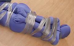 Ver ahora - Completely encased female is bound with duct tape in bdsm bondage scene