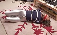 Sexy brunette is gagged and hogtied and left on floor in BDSM solo scene - movie 6 - 3