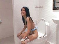 Thai chick Yopa pees on toilet in her fishnet in solo scene - bonus 3 - 4