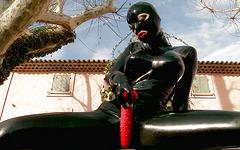 Watch Now - Latex lucy licks a hood ornament and fucks her twat in a garden