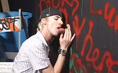 Watch Now - Scruffy skater punk sucks a cock through a glory hole in hot blowjob scene