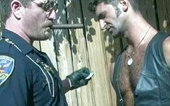 Hot cop in uniform gives a blowjob to a perp as he sits on a motorcycle - movie 1 - 2