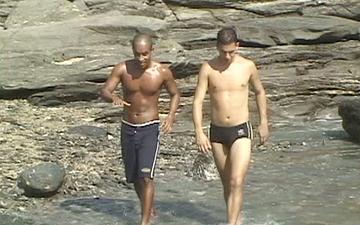 Download Hung latino stud fucks a black hunk by the ocean