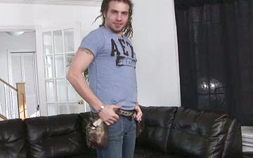 Download Horny jock with long hair gets naked and beats off on the couch