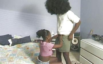 Download A cute black girl sucks and fucks a black guy who has a long hard cock