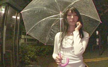 Download Asian girl standing under umbrella picked up and fucked on round bed