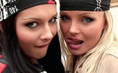 Lesbian action as these two biker chicks eat each other out on a motorcycle join background