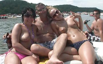 Download Spring break women go topless on a boat and in the water