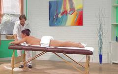 Mischa Brooks grips the massage table as he slips it in - movie 1 - 2