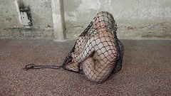 Rebecca Black is fucked with a dildo through a net enclosure - movie 4 - 5