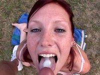 What a sexy red head whore getting throat fucked outdoors on the grass - movie 30 - 7