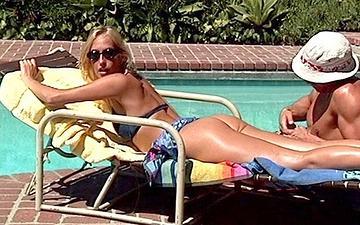 Download Oiled up for an afternoon of sun bathing this blonde gets drilled hard